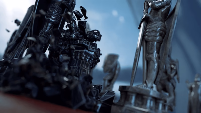 Be Ekhtesar close-up of a dark chess piece breaking into fragments beside a silver armoured figure.