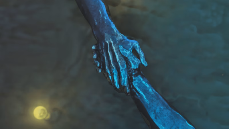 ESAMI close-up of two blue metallic hands gripping each other above a dimly lit rocky surface.