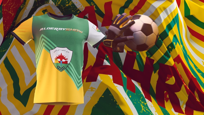 Green and yellow Al-Jahra football shirt with the club crest beside goalkeeper gloves and a football.