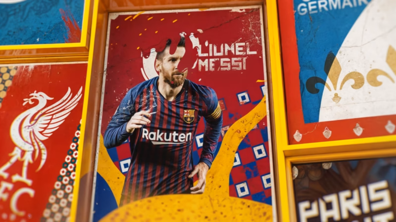 Framed football artwork labelled Lionel Messi, with a Barcelona shirt and red, blue and gold graphics for One Two.