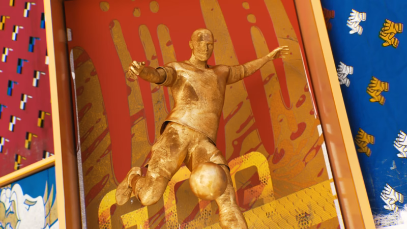 Golden footballer sculpture poised to kick a ball against red and blue framed panels in the One Two artwork.