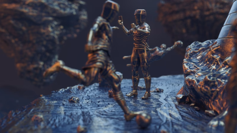 Bronze referee holding up a card as a footballer approaches the ball on a rocky platform in the Qatar 2022 artwork