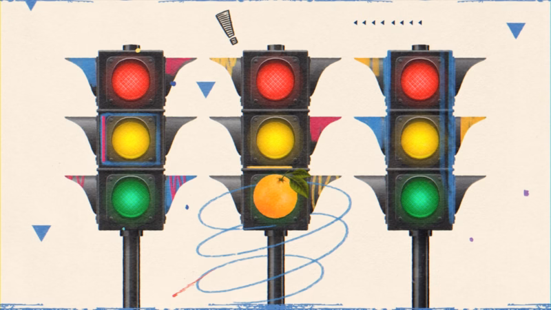 Three traffic lights with an orange replacing the centre green light in playful Good Morning Kuwait collage artwork
